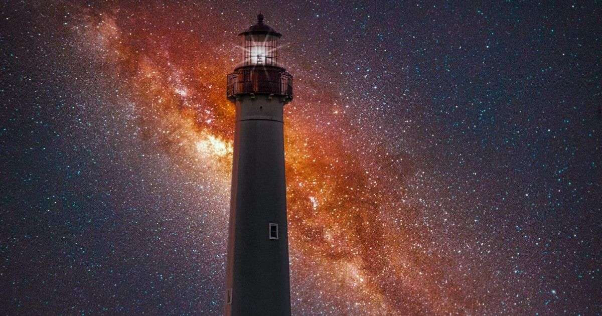 The Old Barney Lighthouse in front of a starry sky in New Jersey