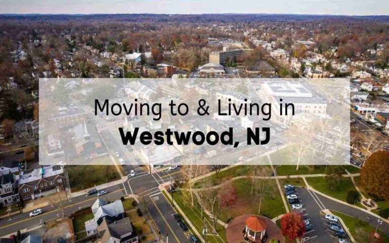 Aerial view of downtown Westwood NJ featuring residential neighborhoods, local shops, and the town gazebo in Veterans Memorial Park.