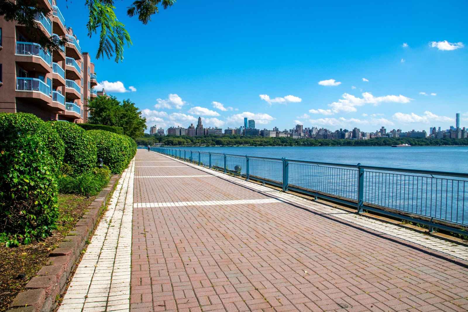 Path along the Hudson River in Edgewater NJ with the Manhattan skyline in the background.
