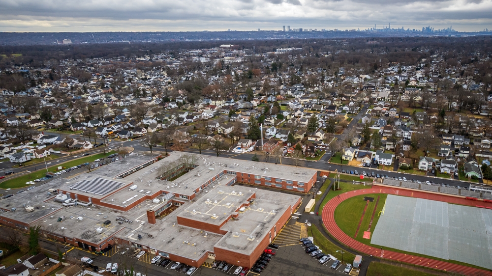 aerial view of cresskill and the school with the track and football field
