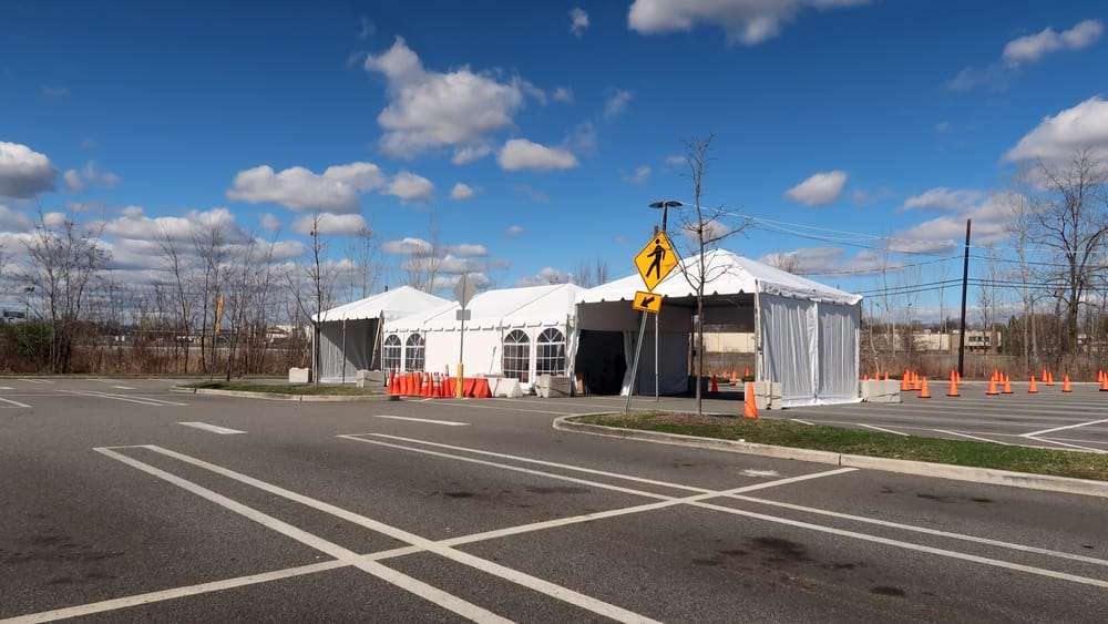 An event tent set up in a parking lot in maywood new jersey