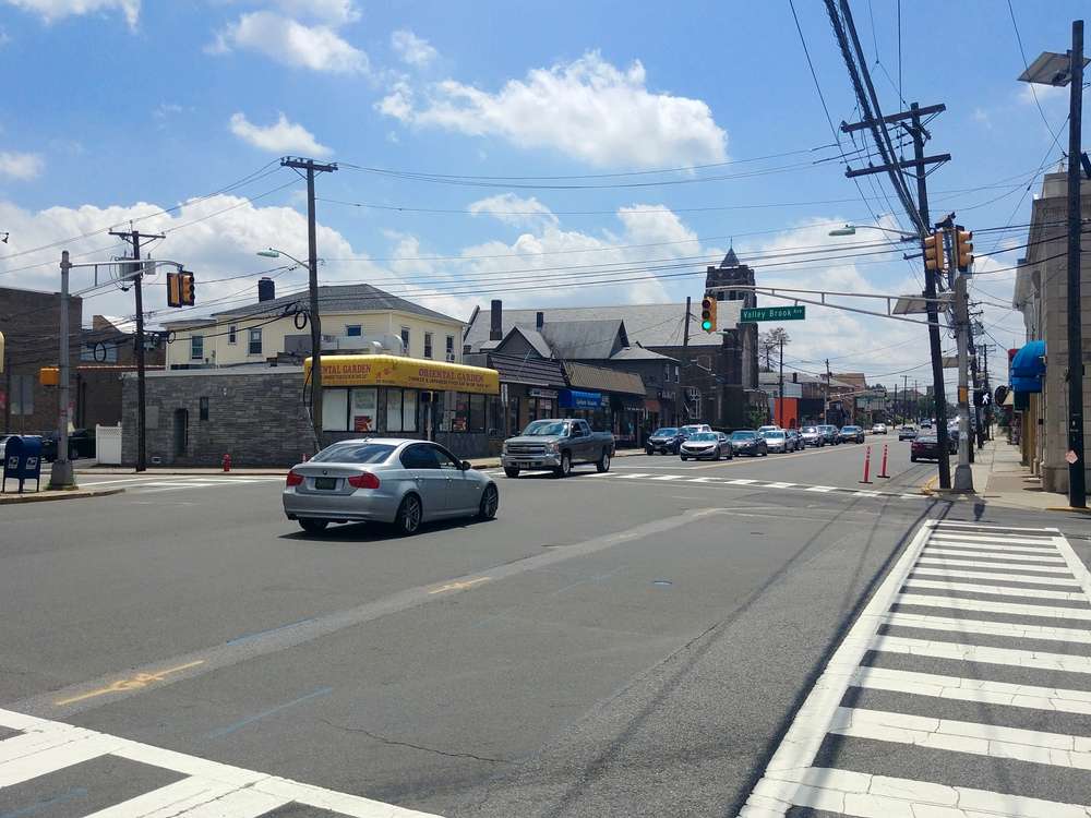 busy lyndhurst new jersey street with cars

