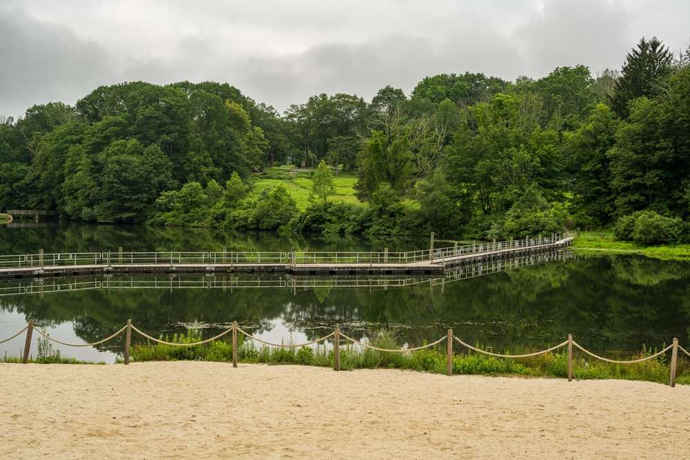 A pond in washington township with a gate surrounding it
