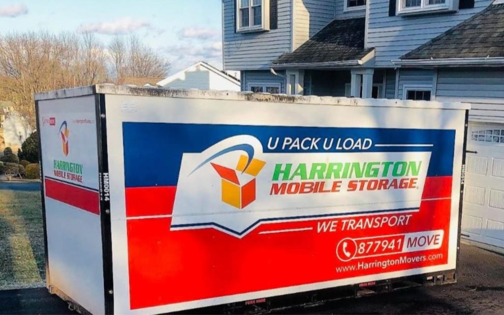 A Harrington Moving and Storage mobile storage container in front of a home in Englewood Cliffs NJ.